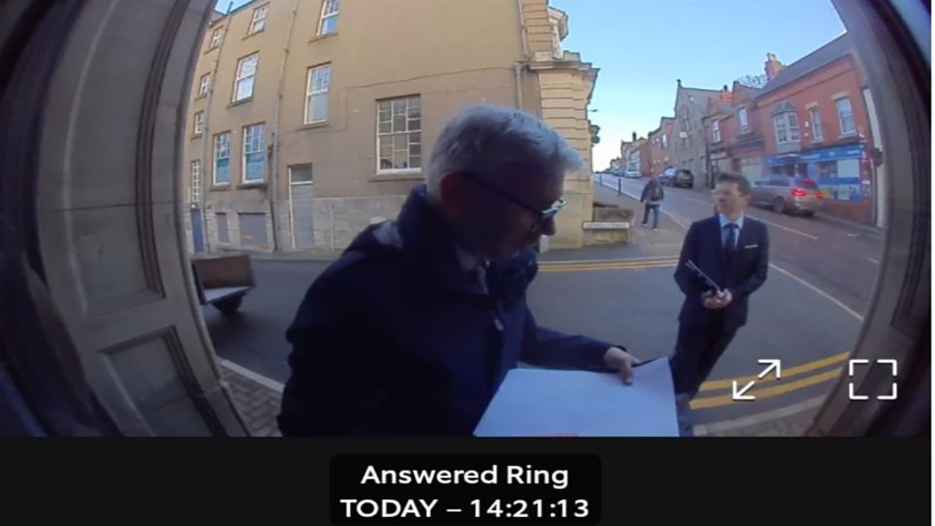 Judge Robert Brown is caught on camera on Mr Askcan's doorstep